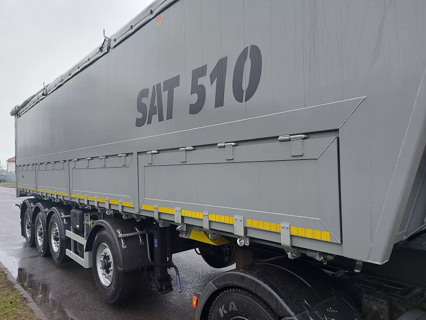 Полуприцеп самосвальный алюминиевый с боковой и задней разгрузкой и вынесенной осью sat510