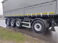 Полуприцеп самосвальный алюминиевый с боковой и задней разгрузкой и вынесенной осью sat510